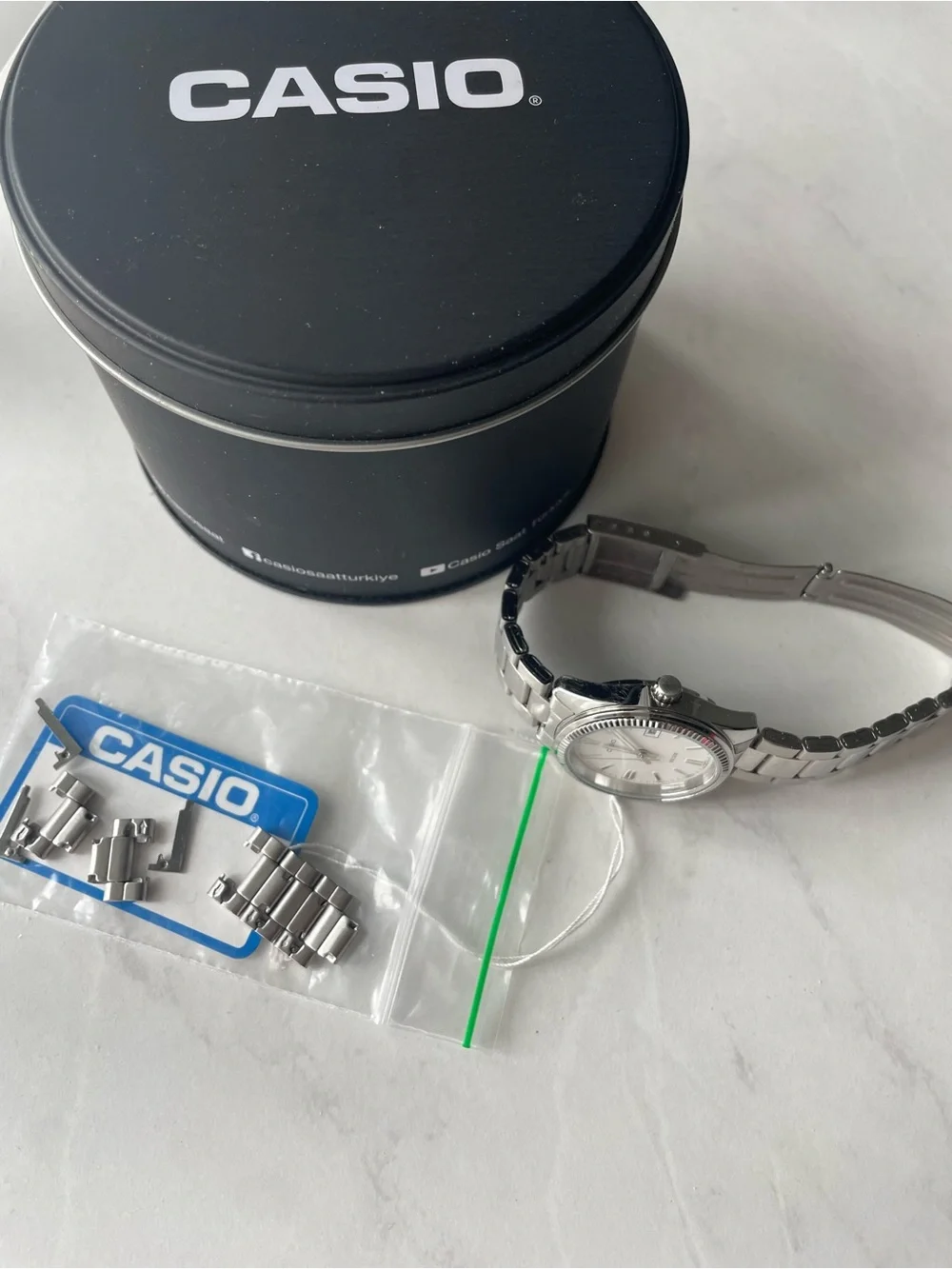 Casio Silver and White Women's Stainless Steel Watch